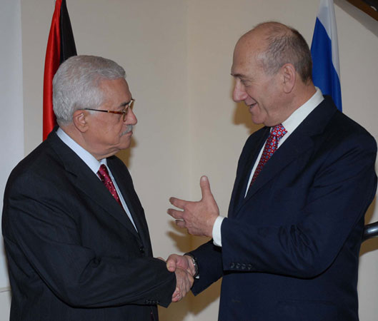 Palestinian leader Mahmoud Abbas meets with Israeli PM Ehud Olmert.