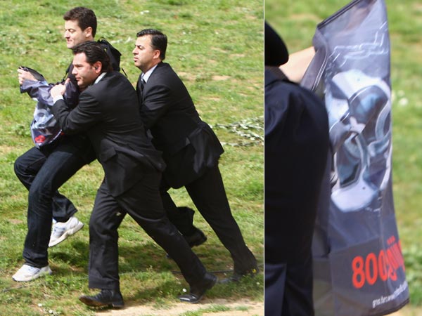 A protester is ejected from the Beijing Olympics torch-lighting ceremony in Greece.