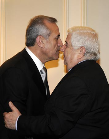 Gen. Michel Suleiman with Syrian Foreign Minister Walid al-Muallem.