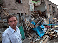 An apartment complex damaged during fighting in Gori, Georgia. Click image to expand.