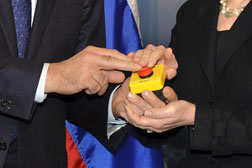The hands of US Secretary of State Hillary Clinton and Russian Foreign Minister Sergei Lavrovthe rest on a red button marked 'reset' in English and 'overload' in Russian (Photo: FABRICE COFFRINI/AFP/Getty Images). Click image to expand.