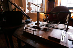 A letter-copying device with two pens known as a "polygraph." Click image to expand.