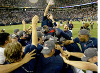 Twins celebrate. Click image to expand.