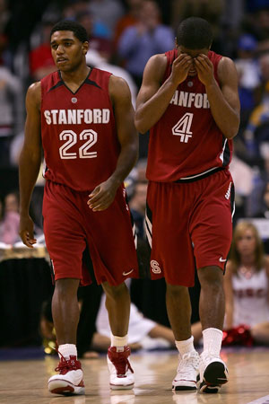 Kenny Brown (22) and Anthony Goods (4) of Stanford.