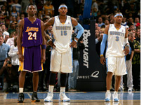 Allen Iverson (far right) and Carmelo Anthony of the Denver Nuggets stand next to Kobe Bryant of the Los Angeles Lakers  
Click image to expand.