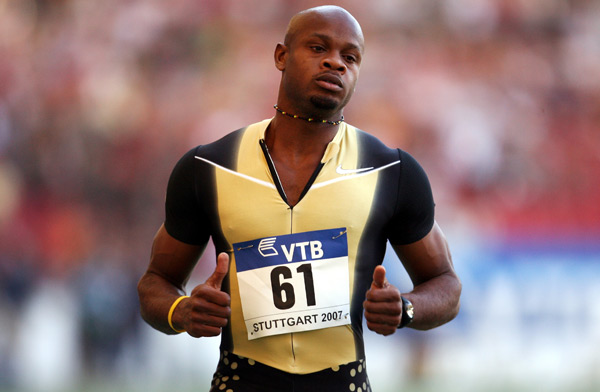 Asafa Powell celebrates winning the men's 100M event of the IAAF/VTB Bank World Athletics Final.