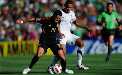 Javier Hernandez of Mexico is pressured by Jermaine Jones of the United States. Click image to expand.