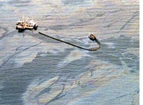 Oil skimming in the wake of the Exxon Valdez spill. Click image to expand.