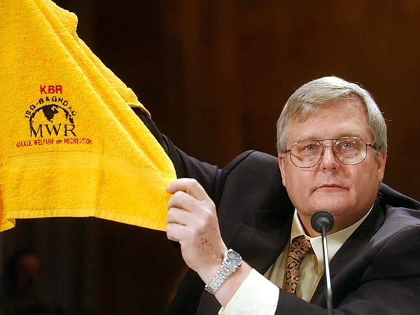 Henry Bunting of Halliburton waving the KBR banner.