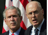 George Bush with Henry Paulson. Click image to expand.