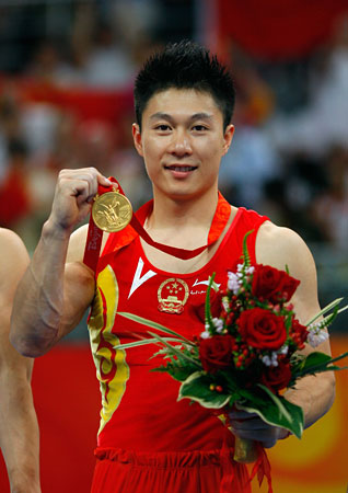 Gymnast Li Xiaopeng of China after winning a gold medal.