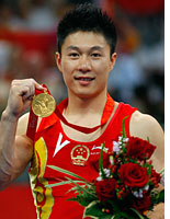 Gymnast Li Xiaopeng of China. Click image to expand.