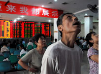 China's shares drop to 20-month low as no new measures introduced. Click image to expand.