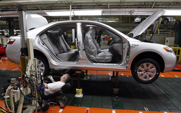 A Toyota Camry Hybrid on the assembly line.