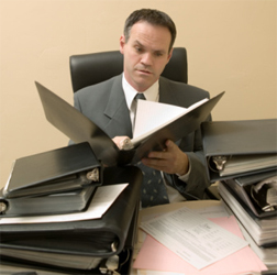 Business man reading report.