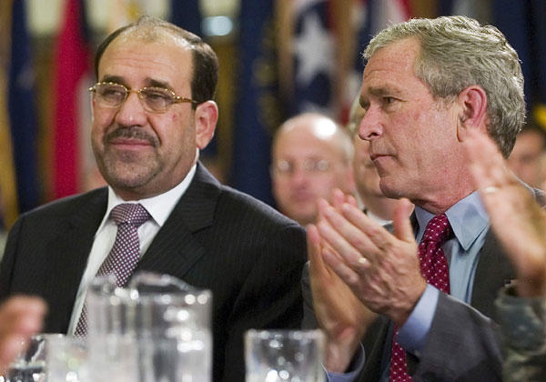 George W. Bush and Nuri al-Maliki.