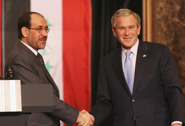 Nouri al-Maliki and George W. Bush.
