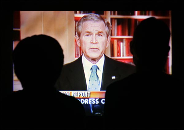 People watching Bush's Iraq speech.