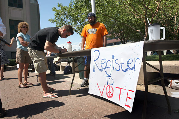 A college student registers to vote.