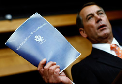 House Minority Leader John Boehner, (R-OH) holds up a copy of the 'Republican Road to Recovery'. Click image to expand.