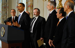 U.S. President Barack Obama (2L) delivers remarks about health care reform. Click image to expand.