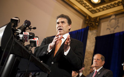 Texas Governor and Republican presidential hopeful Rick Perry speaks at a press conference with American and Israeli Jewish leaders. Click image to expand.