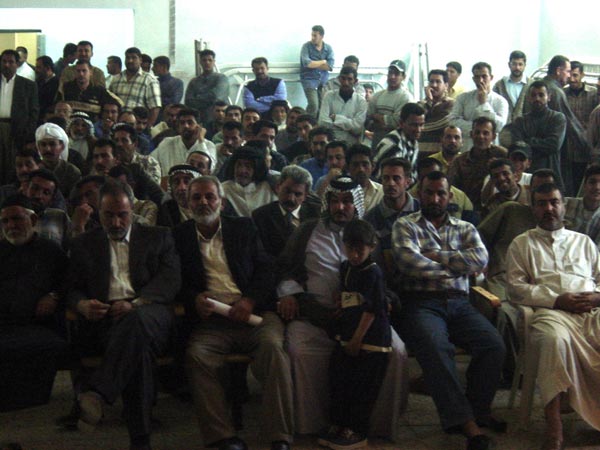 Community leaders in a district council meeting in Maysan.