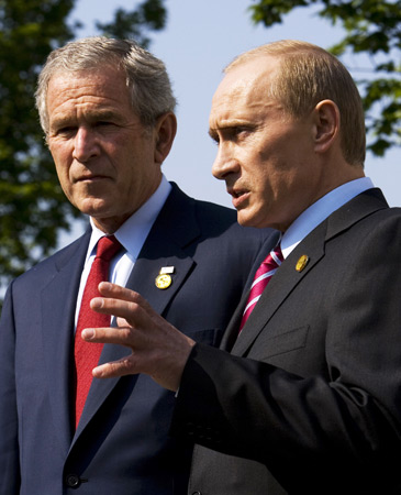 Vladimir Putin, right, and George Bush.