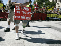 A veteran protests the war in Iraq. Click image to expand.