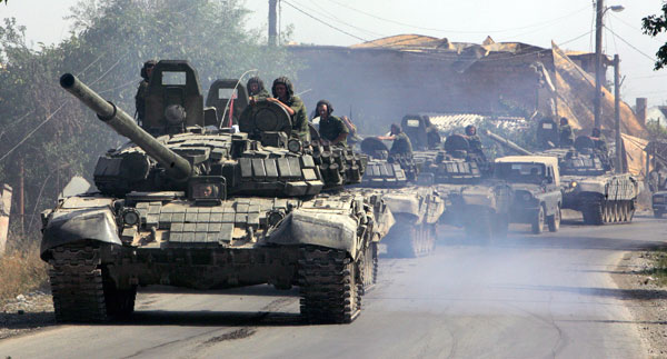 Russian tanks roll on a street in Tskhinvali.