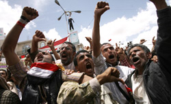 Anti-government protestors show the 'tumbs-down' as they shout demanding the resignation of Yemeni President Ali Abdullah Saleh. Click image to expand.