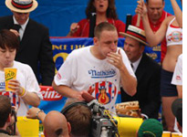 Takeru Kobayashi, left, of Japan, and Joey Chestnut, right
Click image to expand.