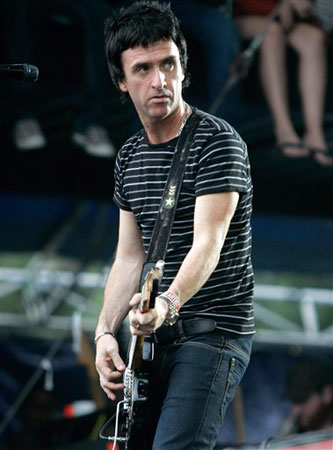 Johnny Marr, former guitarist for the Smiths, performs with Modest Mouse at Lollapalooza.