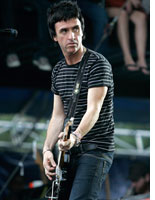 Johnny Marr performs with Modest Mouse at Lollapalooza. Click image to expand.