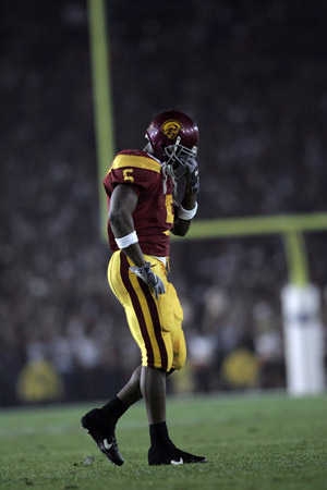 Bush has the Heisman, but his Rose Bowl T-shirt is headed for charity.