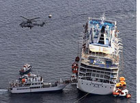 Listing cruise ship. Click image to expand.