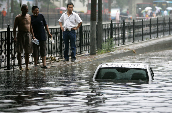 A submerged car in China during floods in 2007.