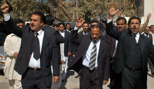 Pakistani lawyers shout anti-Musharraf slogans at a protest.