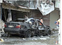 The site of a suicide attack in Baghdad. Click image to expand.