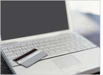 A laptop and credit card