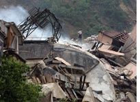 A Beichuan quake survivor in Beichuan, Sichuan province, China. Click image to expand.
