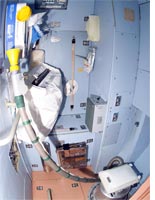 A toilet compartment in the International Space Station. Click image to expand.
