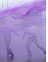 Running from a water canon. Click image to expand