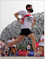 A masked runner in Beijing