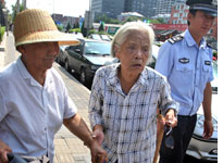 79-year-old mother, Wu Dianyuan, center, and her neighbor Wang Xiuying, 77. Click image to expand.