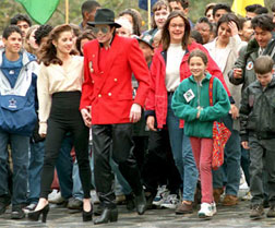 Michael Jackson and Lisa Marie Presley and children.