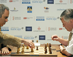 Garry Kasparov and Anatoli Karpov face off. Click image to expand.