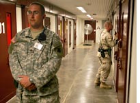 Military guard at Guantanamo Bay 
Click image to expand.