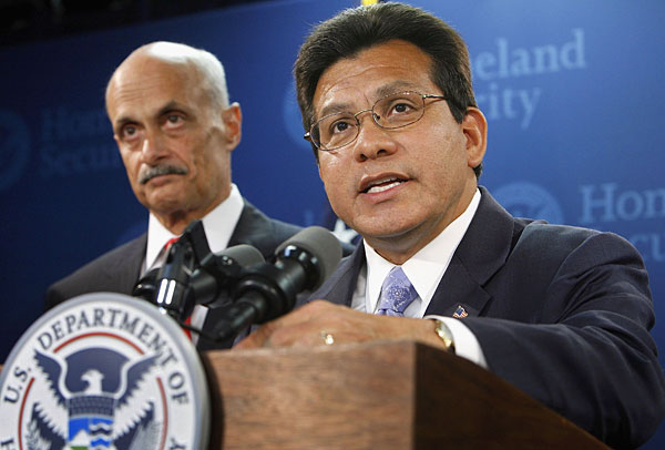Michael Chertoff and Alberto Gonzales.