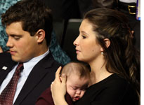 Bristol Palin with her infant brother, Trig, and boyfriend, Levi Johnston. Click image to expand.
